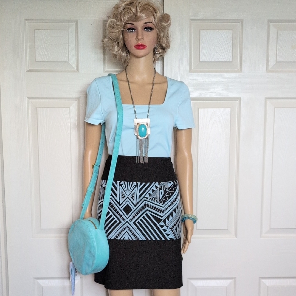 Etcetera  geometric skirt and OQQ bodysuit